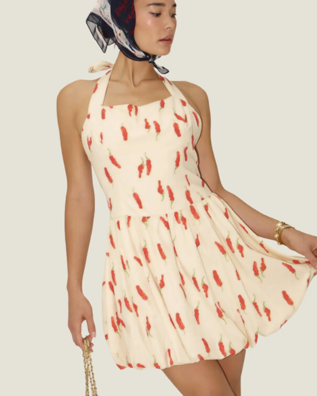 The Posh Spice: Patterned Halter Mini Dress